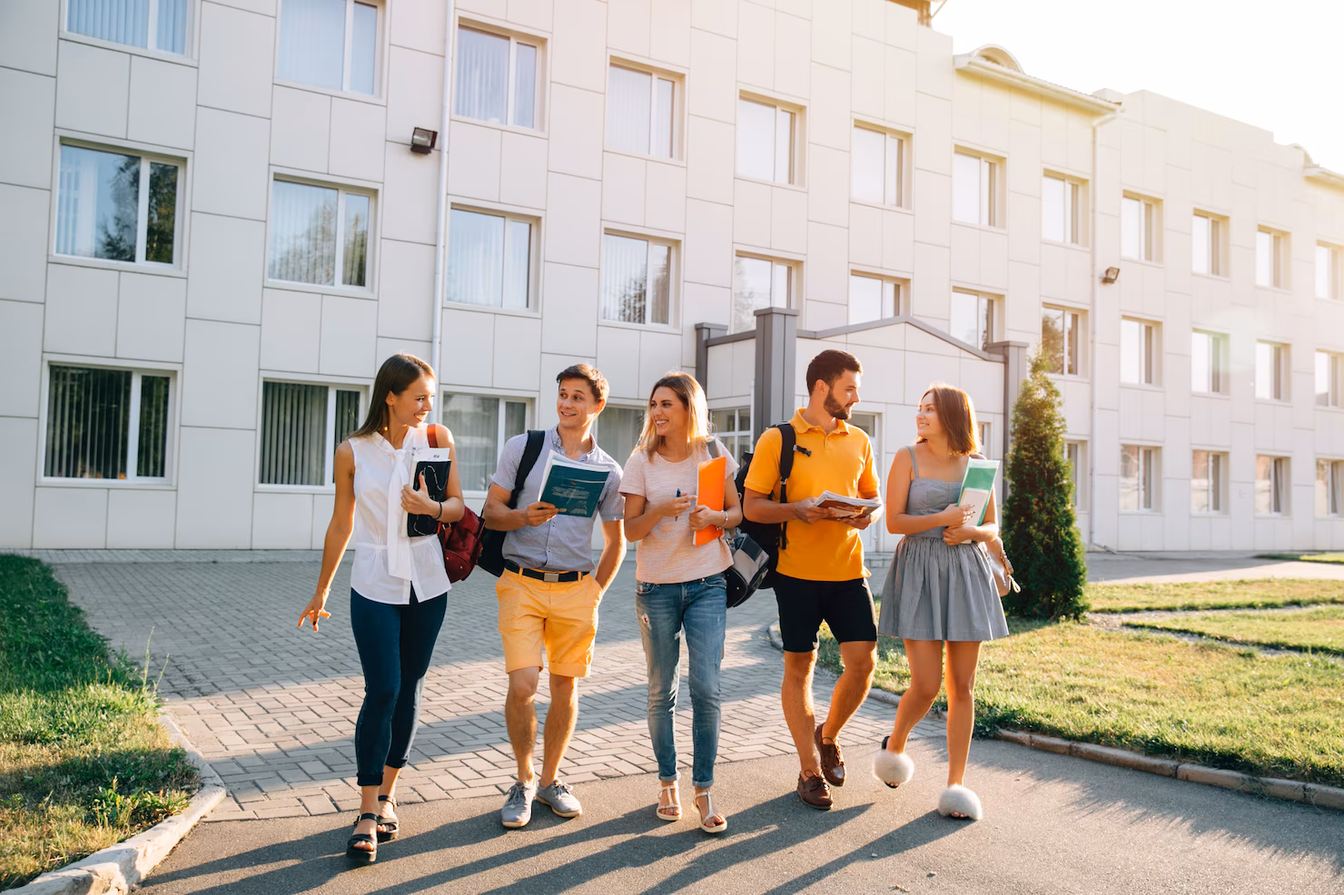 free-time-students-bachelor-s-campus-life-rhythm-five-friendly-students-are-walking_8353-6408